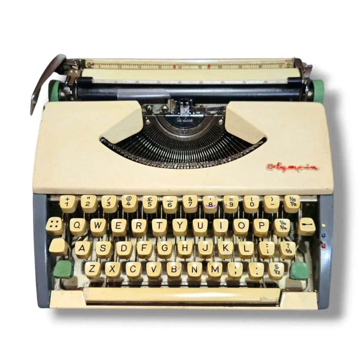 Olympia portable typewriter front view, manual English typing machine by RR Typewriter Mart typewriter seller