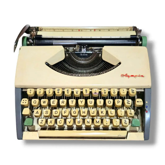 Olympia portable typewriter front view, manual English typing machine by RR Typewriter Mart typewriter seller