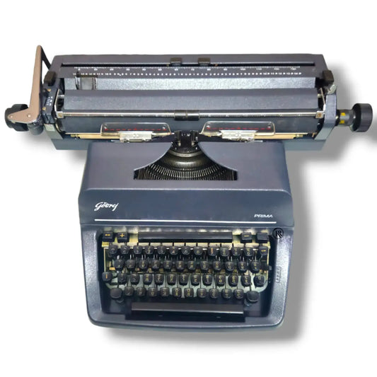Godrej Prima Hindi brief typewriter full grey front view with Devanagari keyboard