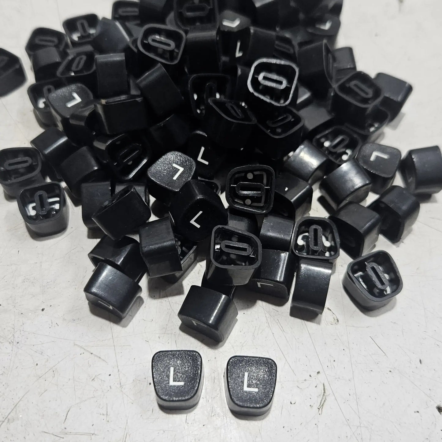 Black Godrej English L typewriter loose keytops for manual typewriter repair, restoration and typing machine spare parts
