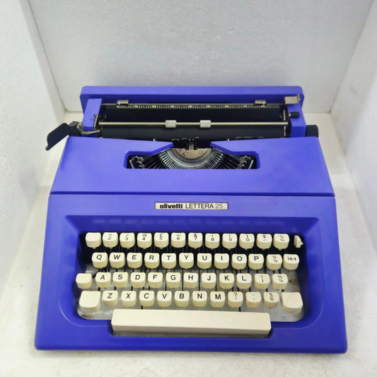 Full-front view of Olivetti Lettera 25 Typewriter in Carbon Purple Edition showcasing sleek design | RR Typewriter Mart