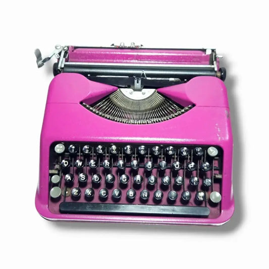 Pink Hermes Baby manual English typewriter from RR Typewriter Mart imported typewriter shop collection