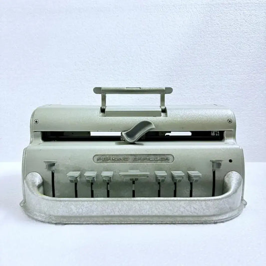 Front view of imported Perkins Braille Typewriter with six-key Braille typing machine layout by RR Typewriter Mart