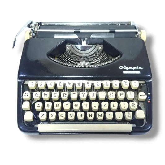 Royal black Olympia Splendid 66 manual English typewriter by RR Typewriter Mart, imported typing machine