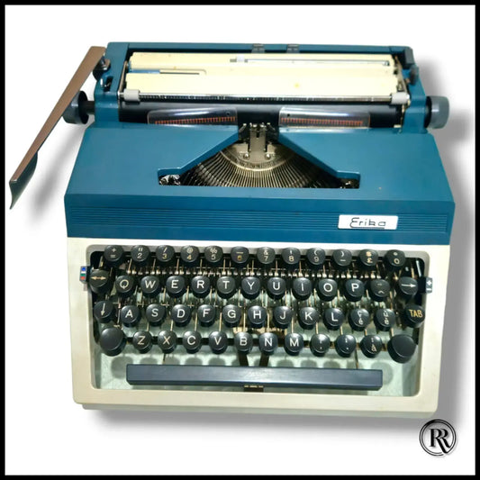 Blue Erika manual English typewriter close-up, German typing machine by RR Typewriter Mart