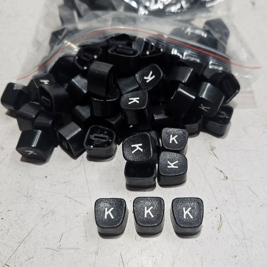 Black Godrej English K typewriter loose keytops for manual typewriter repair, restoration and typing machine spare parts