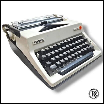 Olympia Monica vintage manual typewriter in ivory with black keys, German portable typing machine for writers