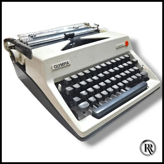 Olympia Monica vintage manual typewriter in ivory with black keys, German portable typing machine for writers