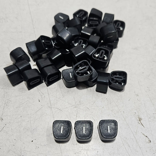 Replacement I keytops for manual typewriters, typing machine servicing parts and restoration components displayed