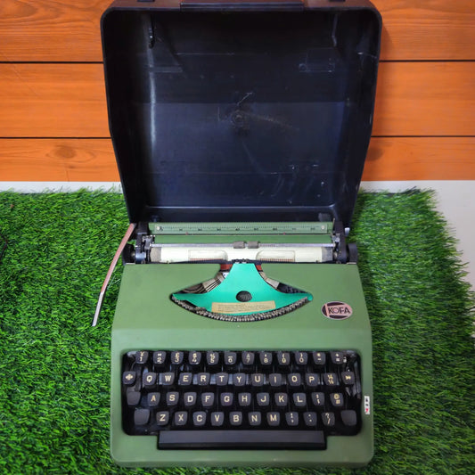 Brand new KOFA 100 green Manual English Typewriter by RR Typewriter Mart with original case and box