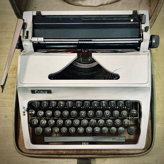 Erika Model 32 German portable typewriter professionally restored by RR Typewriter Mart with smooth typing action
