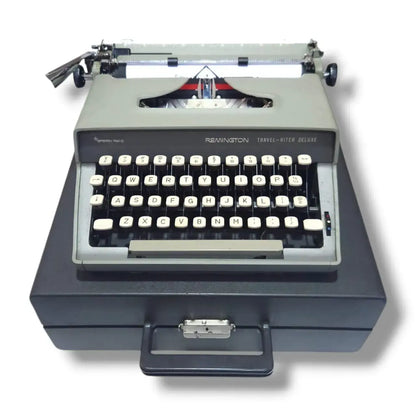 Remington Travel-Writer Deluxe typewriter with carrying case, vintage English manual typing machine by Sperry Rand