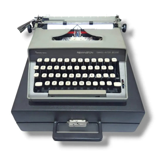 Remington Travel-Writer Deluxe typewriter with carrying case, vintage English manual typing machine by Sperry Rand