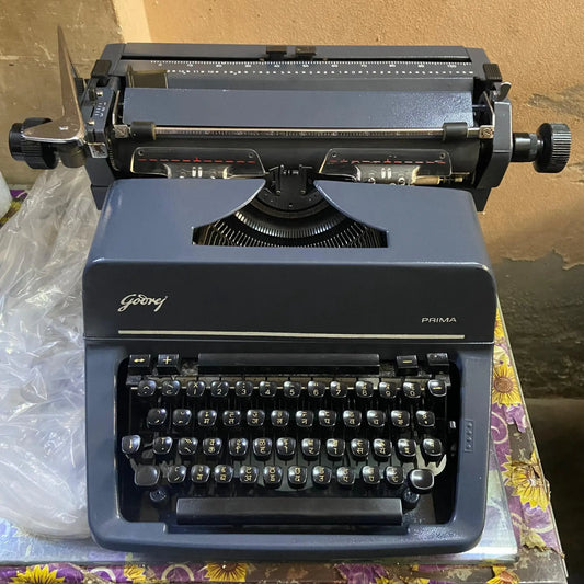 Front view of Godrej Hindi Typewriter with Devanagari script keyboard and vintage design