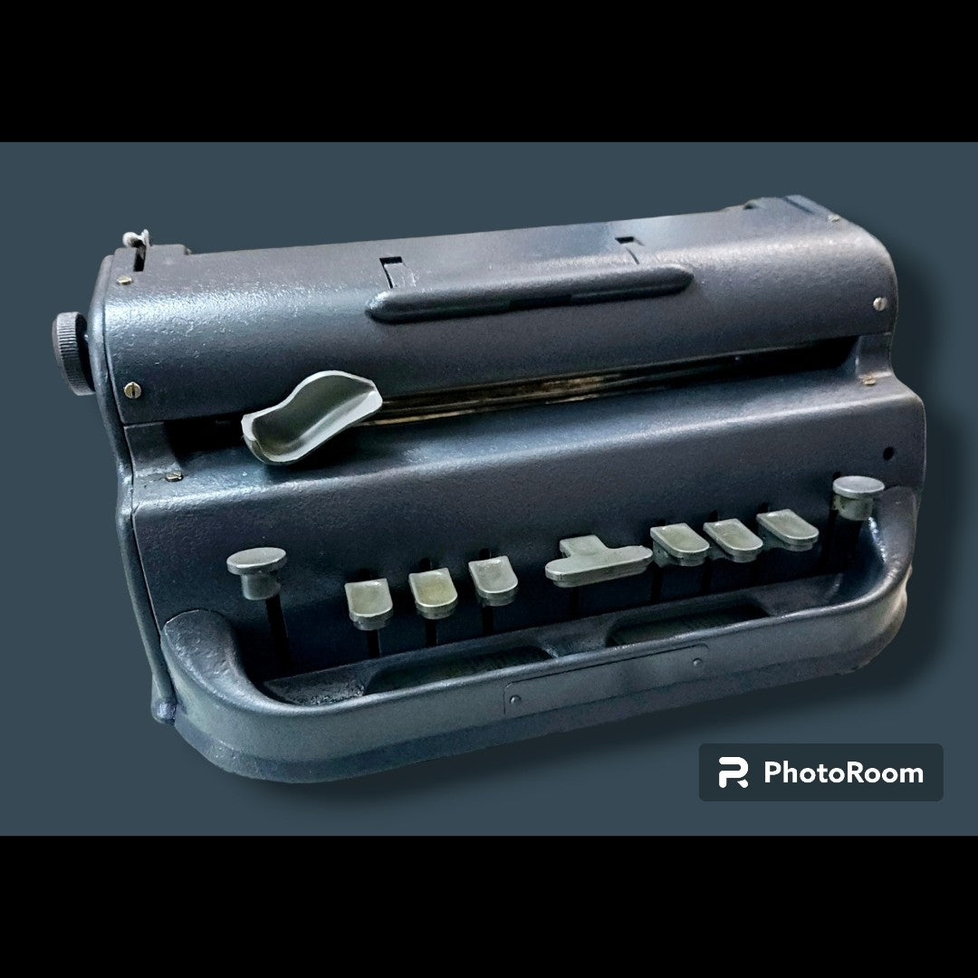 Front angled view of Perkins Braille Typewriter, manual braille typing machine by RR Typewriter Mart with restored finish