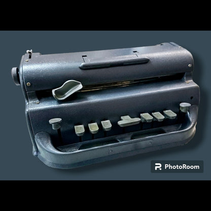 Front angled view of Perkins Braille Typewriter, manual braille typing machine by RR Typewriter Mart with restored finish
