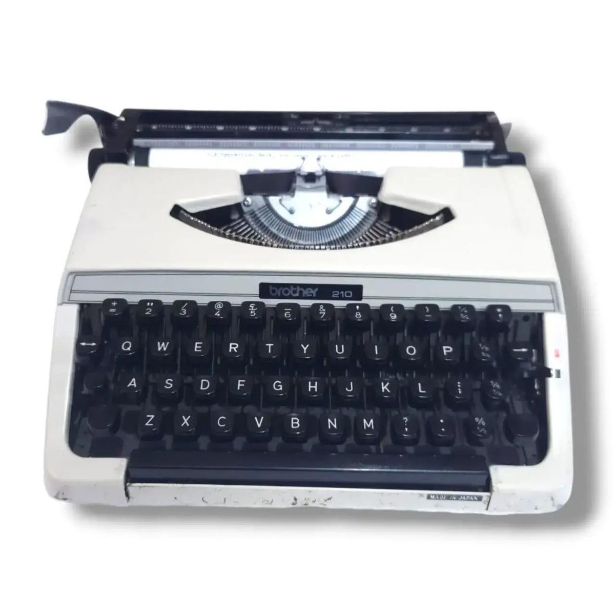 Brother 210 ivory white manual English typewriter with black keyboard, Japanese portable typing machine by RR Typewriter Mart