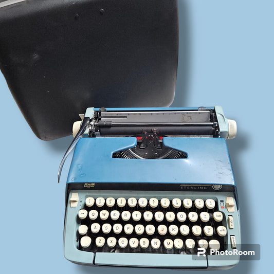 Ocean blue Smith Corona Sterling manual typewriter with vintage case, classic portable typing machine for writers