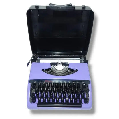 Brother Charger 11 vintage mauve portable typewriter with original carry case open