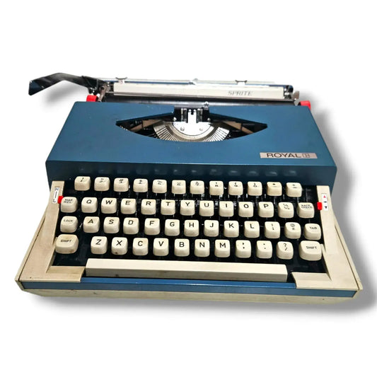 Royal Sprite Portable Manual Typewriter front view with blue body and QWERTY keyboard | RR Typewriter Mart