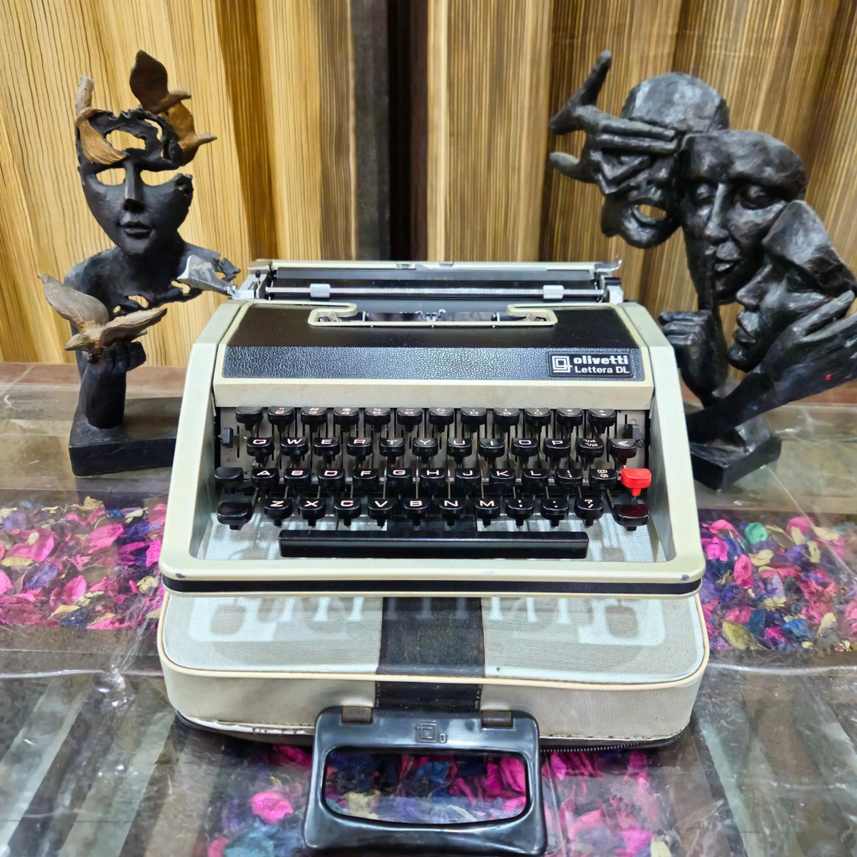 Front view of Olivetti typewriter with leather body and English keys, portable classic by RR Typewriter Mart