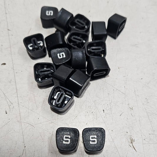 Black Godrej S typewriter keytops displayed on a worktable, typing machine spare parts for typewriter restoration