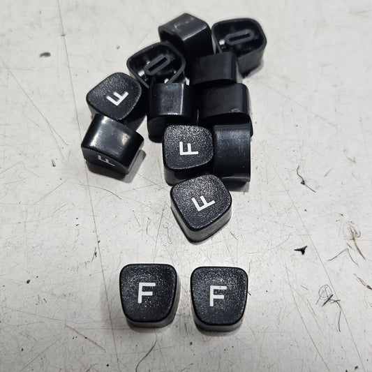 Black Godrej English F typewriter loose keytops for manual typewriter repair and restoration at RR Typewriter Mart