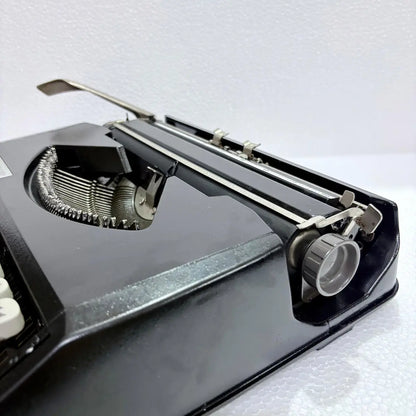 Black Shadow Hermes Baby vintage portable typewriter, classic QWERTY typing machine, RR Typewriter Mart online