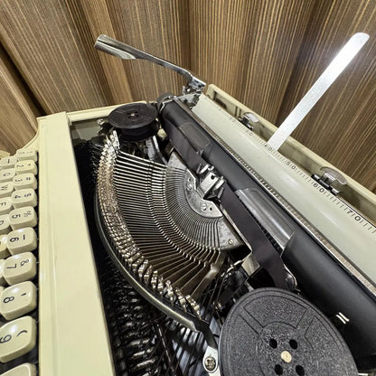 Kovac manual typewriter for collectors and writers, showcasing original grey and white styling in mint old stock condition | RR Typewriter Mart