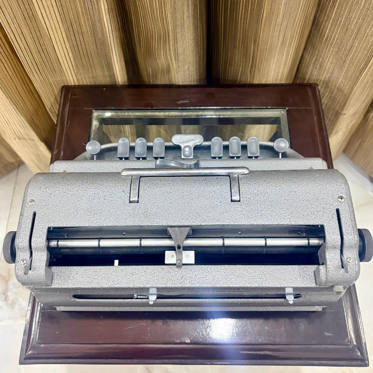 Front angled photograph of the Perkins Braille writing machine highlighting key layout and original finish at RR Typewriter Mart India.