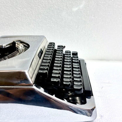 Mirror chrome Brother 210 manual typewriter with vintage mechanical design from RR Typewriter Mart India