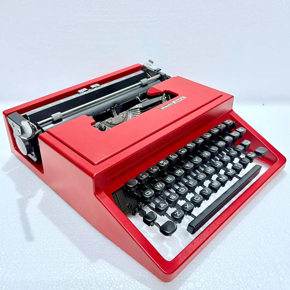 Olivetti Dora Carmine portable typewriter, vivid red manual writing machine, RR Typewriter Mart India online store