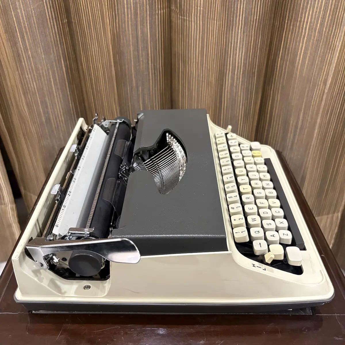 Japanese Kovac portable typewriter with a refined ivory white body, grey top panel and classic vintage character | RR Typewriter Mart