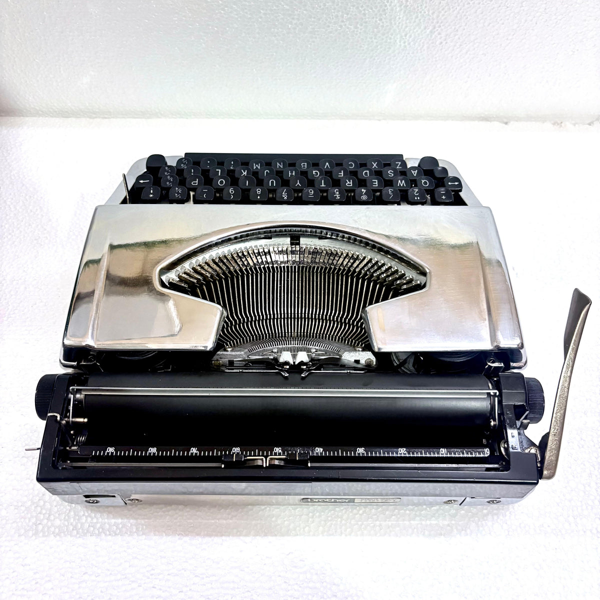 Brother 210 chrome typewriter store listing with restored mechanism from RR Typewriter Mart India for writers
