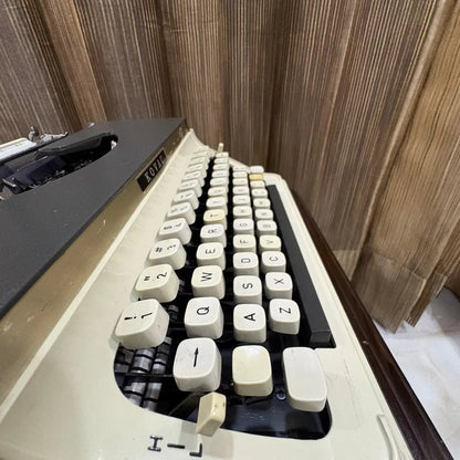 Explore the Kovac portable typewriter with original grey and ivory styling, a mechanical writing machine with vintage appeal | RR Typewriter Mart