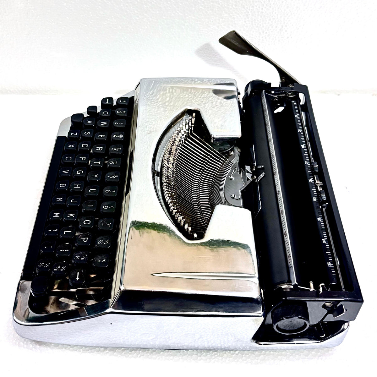 Custom Brother 210 chrome portable typewriter with black keyboard for writers and collectors in India