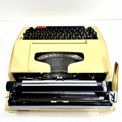 Arabic Brother Deluxe 750TR typewriter with cream body and black Arabic keys, suitable for collectors and Arabic writers in India now
