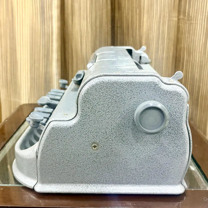 Close up of the Perkins Brailler paper feed and embossing area for tactile Braille writing at RR Typewriter Mart for Braille users in India.