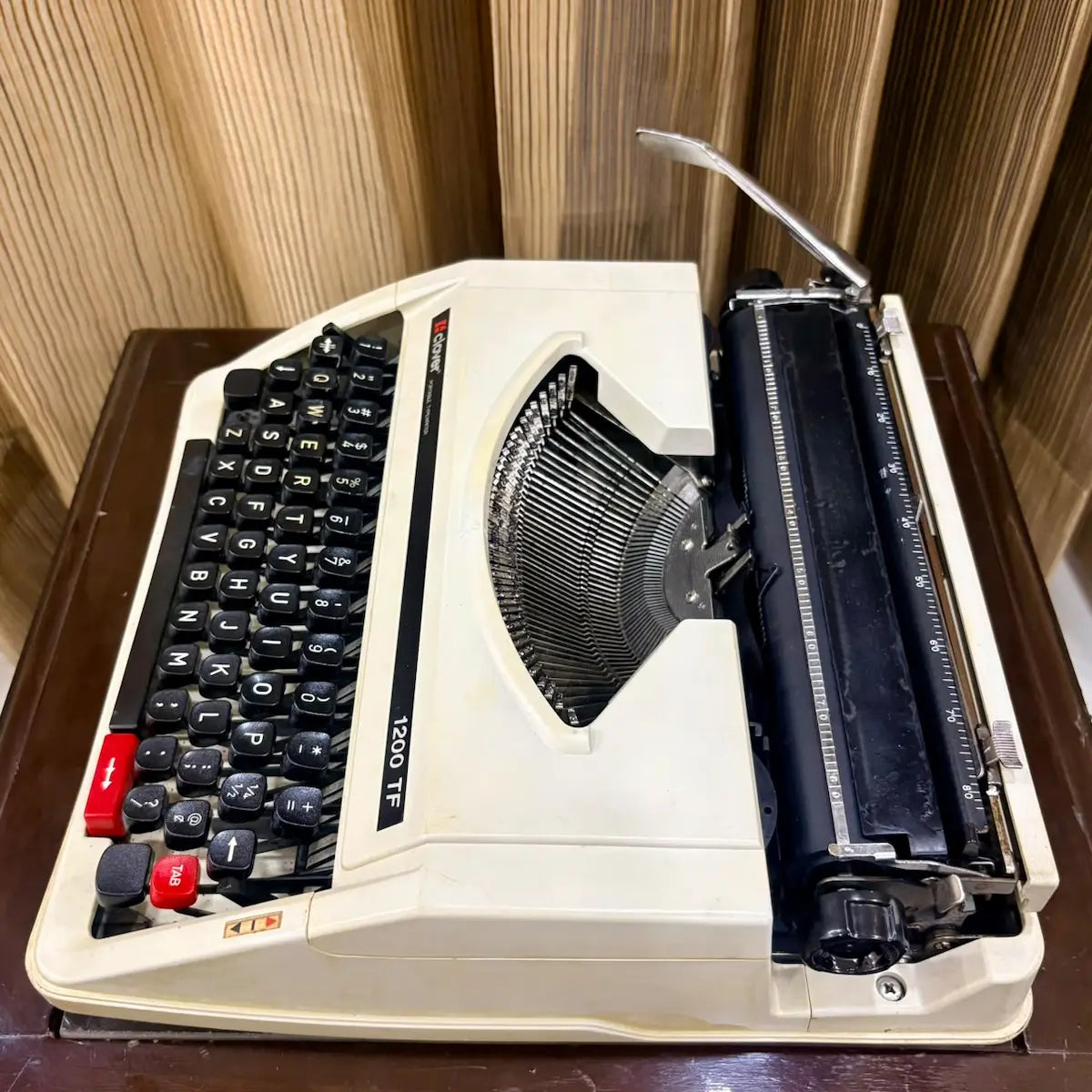 Clover 1200 TF ultra portable typewriter side detail, compact manual typing machine for writers in India