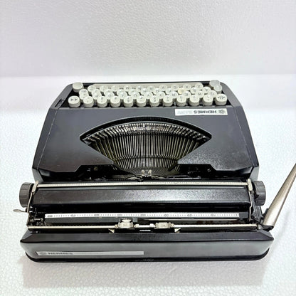 Hermes Baby Black Shadow portable typewriter, vintage mechanical typing machine, RR Typewriter Mart from Delhi