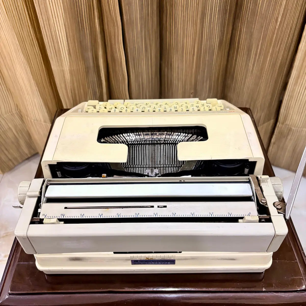 Royal Junior semi portable typewriter case close-up showing hard carrying case handle, from RR Typewriter Mart.