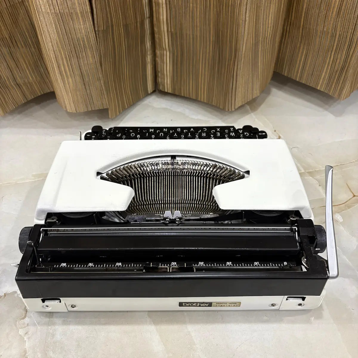 Pearl White Brother Deluxe 220 manual typewriter, classic portable mechanical typewriter from RR Typewriter Mart for collectors in India