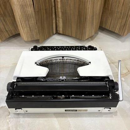 Pearl White Brother Deluxe 220 manual typewriter, classic portable mechanical typewriter from RR Typewriter Mart for collectors in India