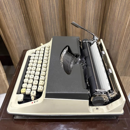 Kovac M-101A portable manual typewriter with original ivory and charcoal grey finish, never typed on before | RR Typewriter Mart