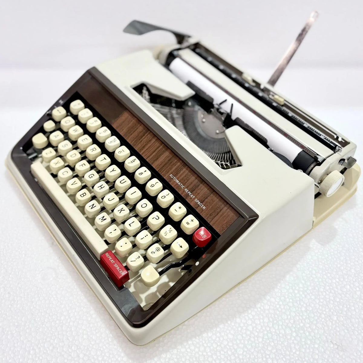 Angled view of Brother Japanese portable typewriter showing keyboard layout, buy manual English typewriter online