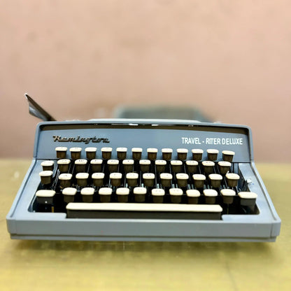 Classic Remington Travel-Riter De Luxe portable typewriter, 1950s collectible from RR Typewriter Mart.