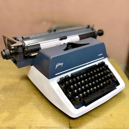 Complete Godrej English Typewriter set from RR Typewriter Mart, fully restored and ready for immediate use with accessories.