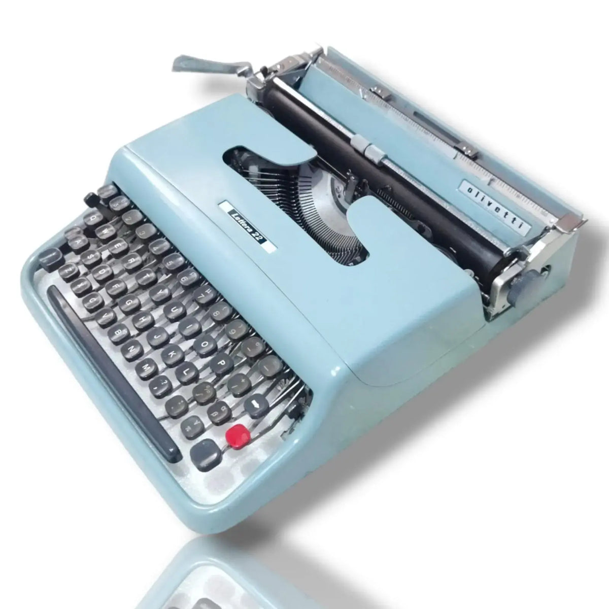 Angled Olivetti Lettera typing machine in blue from trusted typewriter seller RR Typewriter Mart