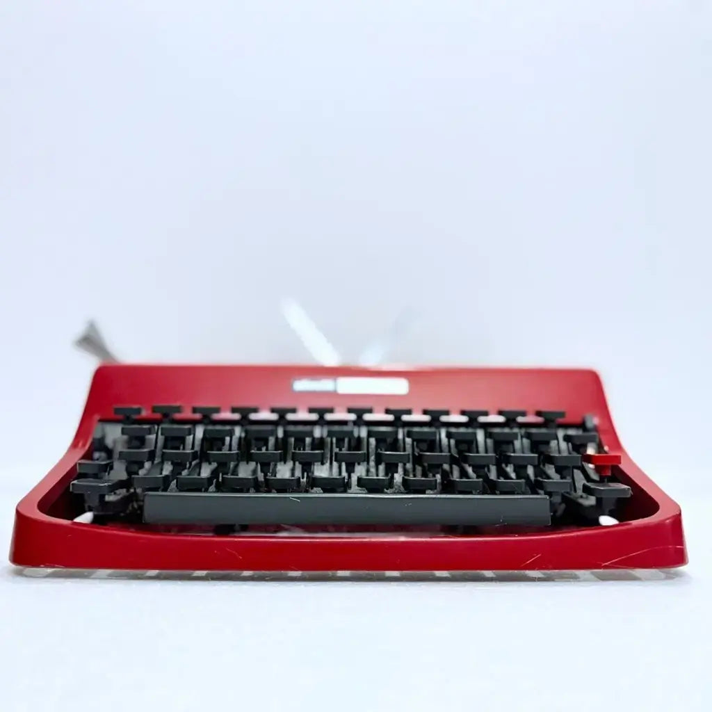 Close-up of Olivetti Lettera 32 Rasso Red Typewriter showing keys and logo, restored by RR Typewriter Mart