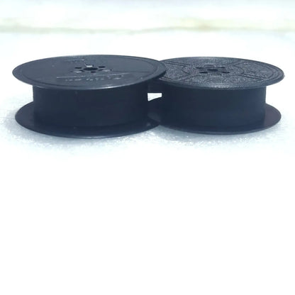 Side profile of black typewriter ribbon roll spools, manual typewriter ribbons for typing machine use